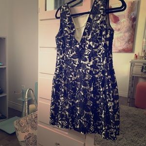 Beige and black dress